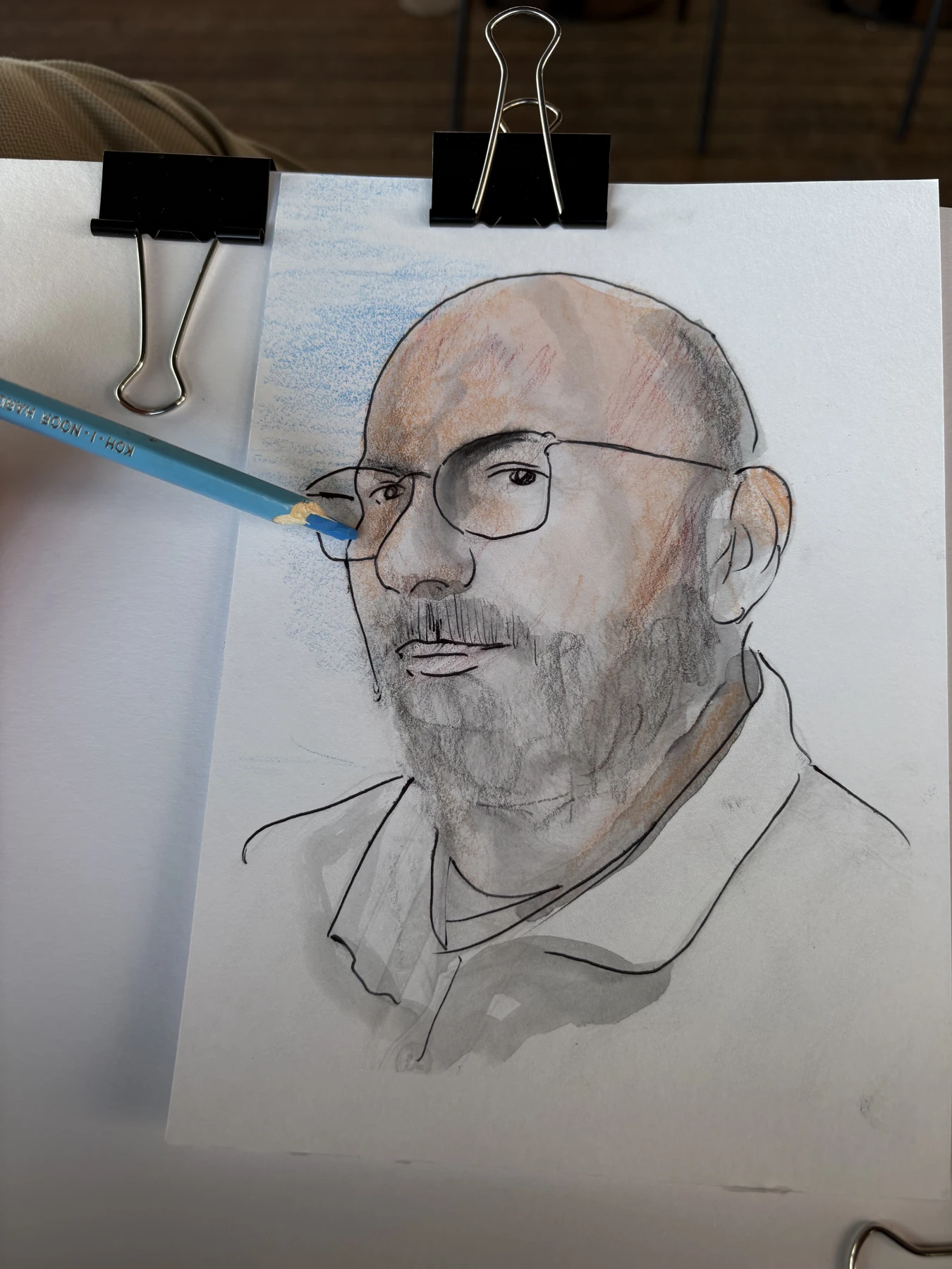 Portrait au crayon et en couleur, en cours de réalisation